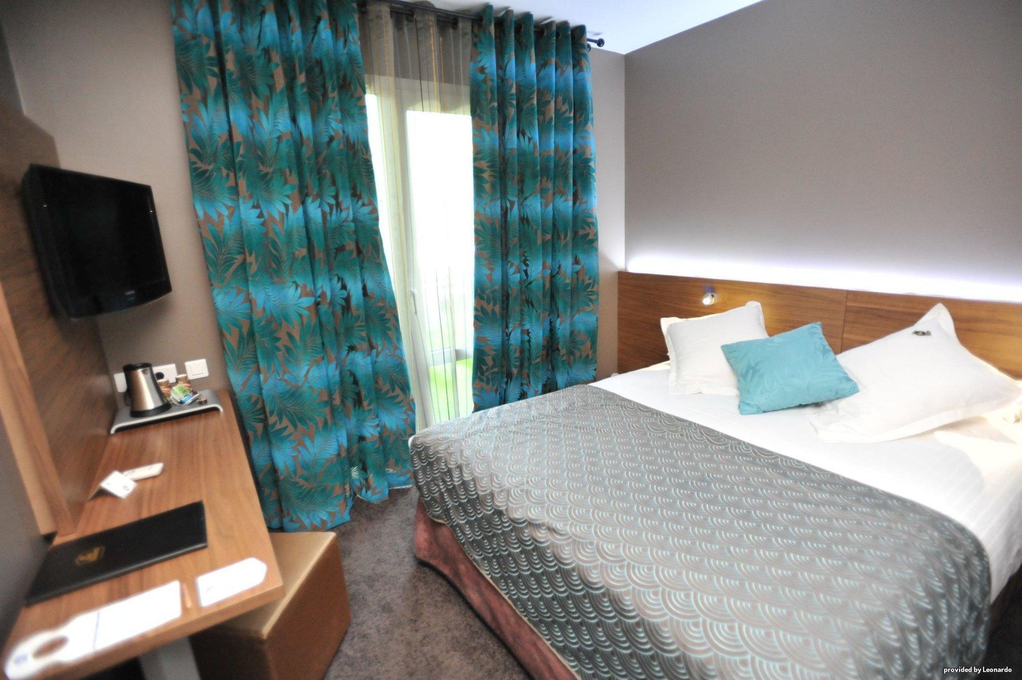 Hotel Full Colors Craponne Rum bild